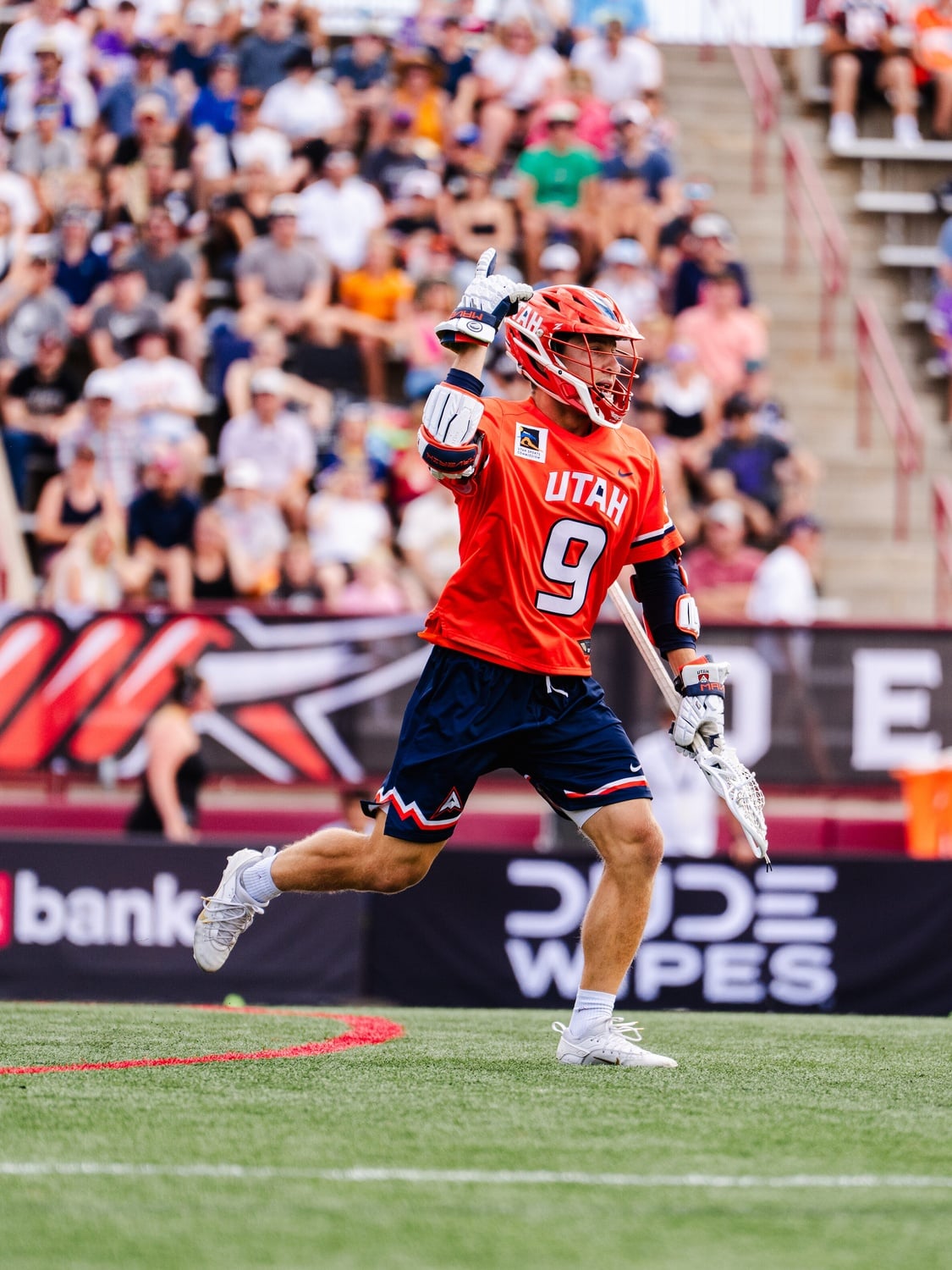 Sam King '25 celebrates a goal for the PLL's Utah Archers. 