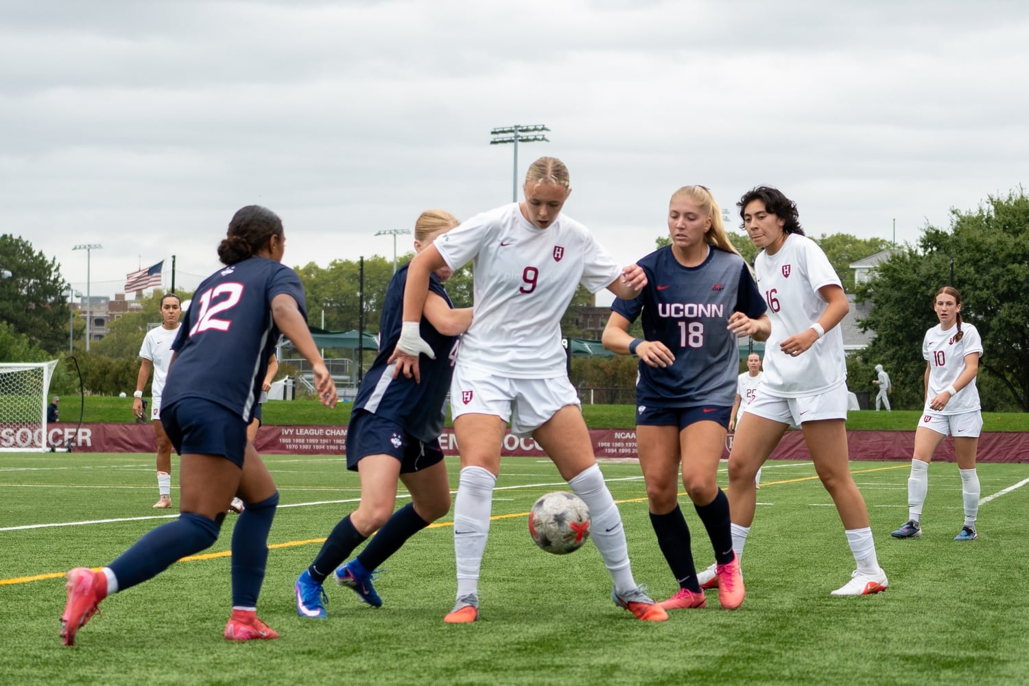 Captain Ólöf Kristinsdóttir boxes out the Huskies during Harvard's clash against UConn. 