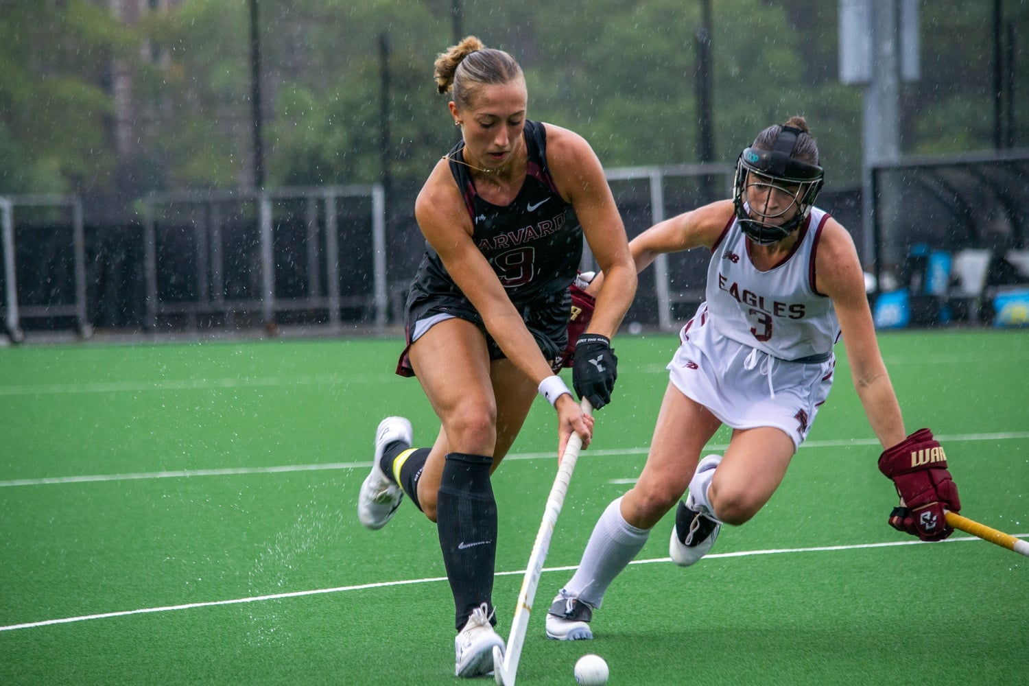 Junior captain Tilly Butterworth surges into the circle during Harvard's game against Boston College. Butterworth scored the game-winning goal in Sunday's shootout against Northeastern.