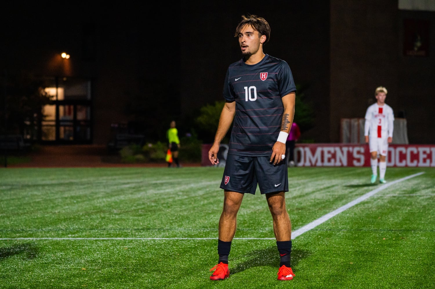 Senior midfielder Ben Kelly battles during a game against Boston University. 
