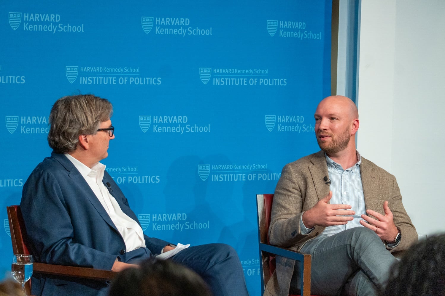Peter McCrory, Chief Economist at Anthropic, on the right, speaking at JFK Jr. Forum moderated by Jason Furman '92, Aetna Professor of the Practice of Economic Policy, Harvard Kennedy School on the left.