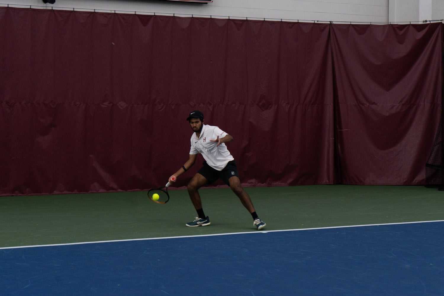 Rohan Murali winds up to hit a forehand against North Carolina State in the spring of 2026. 