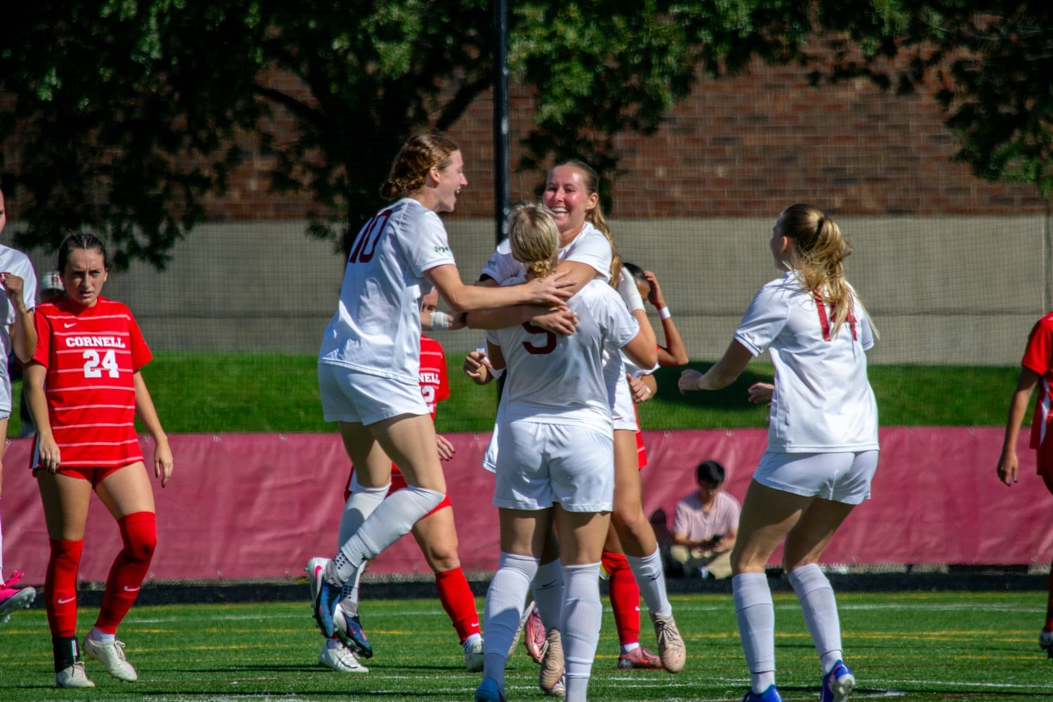 Senior midfielder Anya Van Den Einde celebrates with her team after delivering a perfect assist to captain Ólöf Kristinsdóttir.