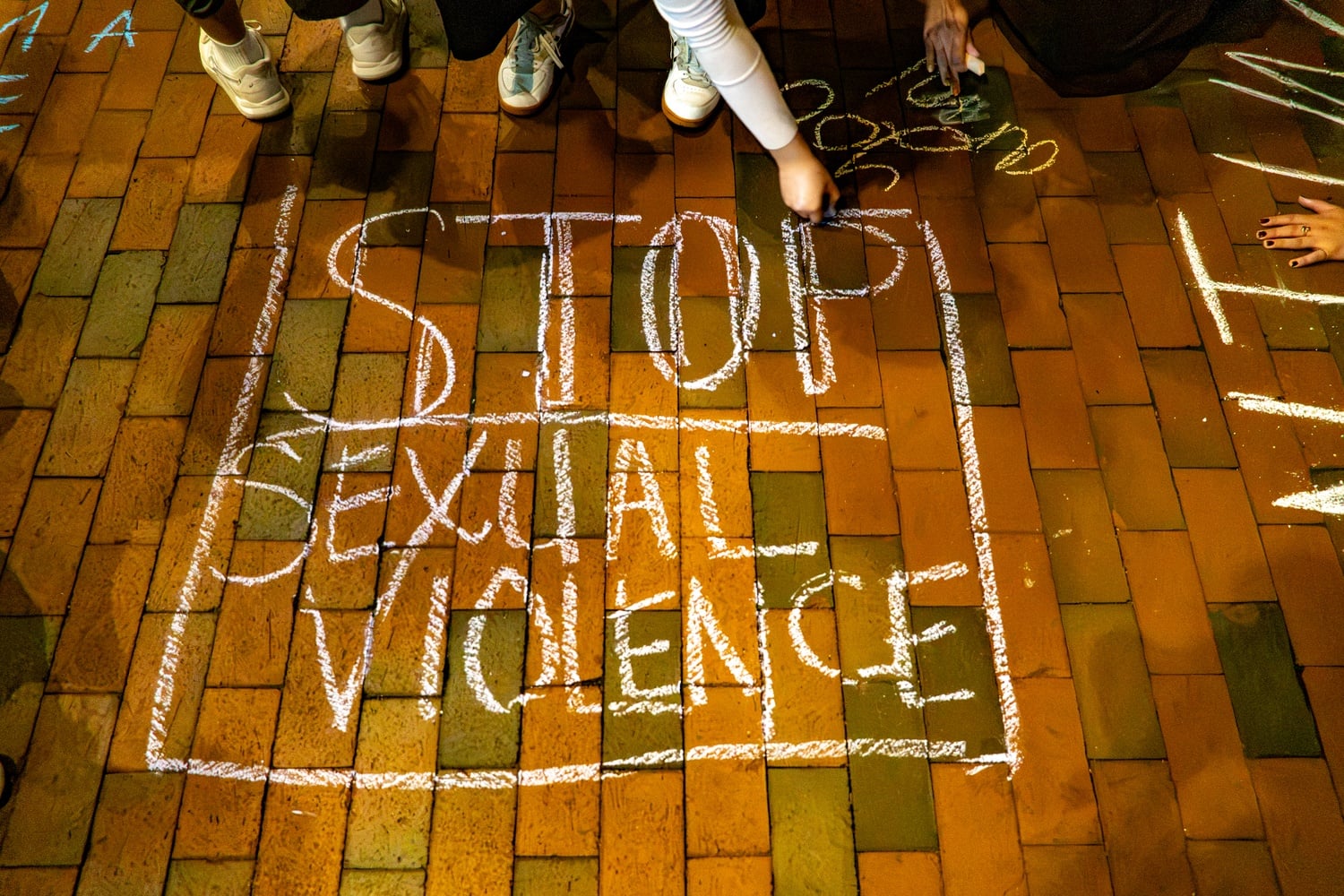 More than 100 Harvard affiliates gathered to protest sexual violence outside of Zimmer Hall, joining a nationwide day of action calling for justice for the former Cornell University student and a Louisiana State University student, who have both alleged sexual assault.
