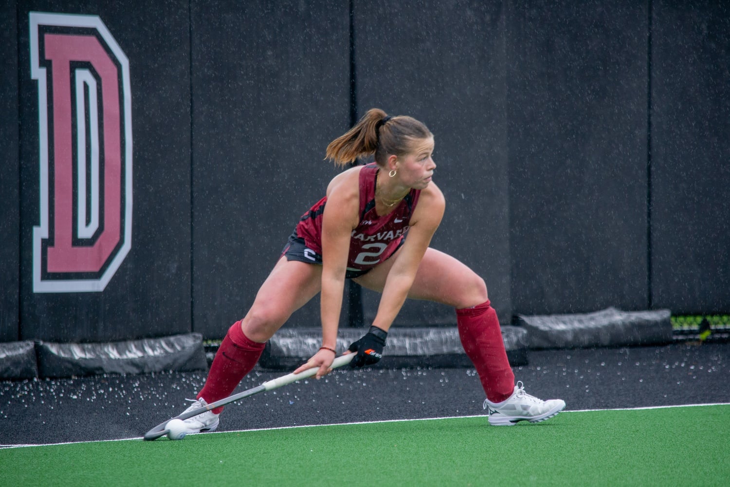 Junior midfielder Martha le Huray inserts a penalty corner. The Crimson scored on a series of corners against Boston University on Sunday.