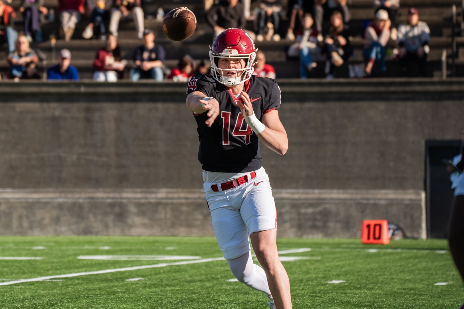Sophomore quarterback Charlie Smith slings a pass against Princeton
